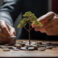 Financial Growth: Photo of a Businessman Planting a Money Tree for Prosperity